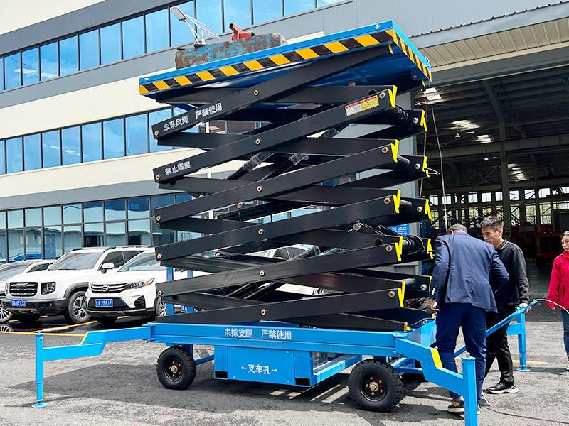 18-Meter Traction Scissor Lift Platform: 380V AC Powered High-Reach Solution for Industrial Applications
